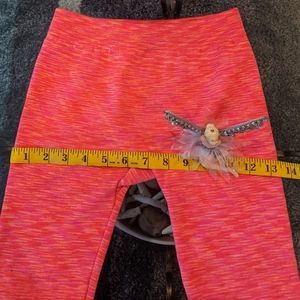 Famous pink in size small for girl.